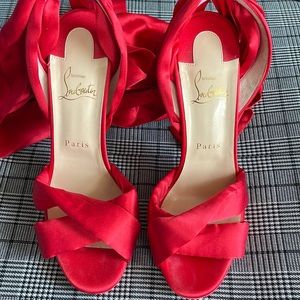 LOUBOUTINS. Gently worn. Red satin heels size 38 1/2 (US 8 /12)